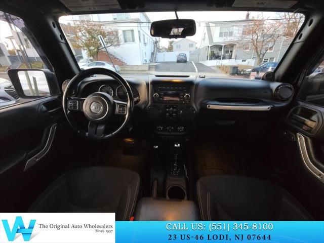 used 2014 Jeep Wrangler Unlimited car, priced at $9,997