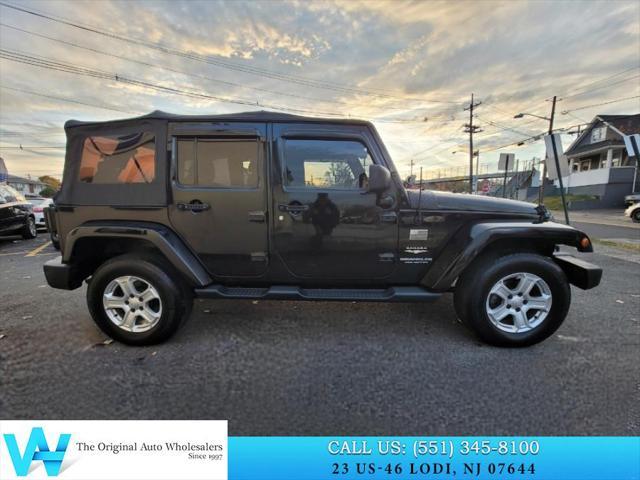 used 2014 Jeep Wrangler Unlimited car, priced at $11,997