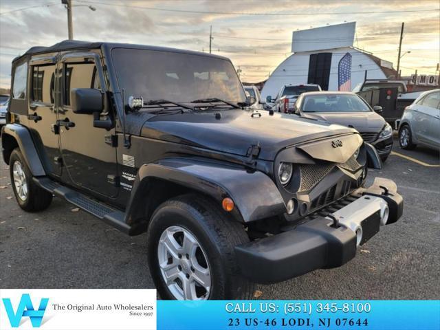 used 2014 Jeep Wrangler Unlimited car, priced at $11,997