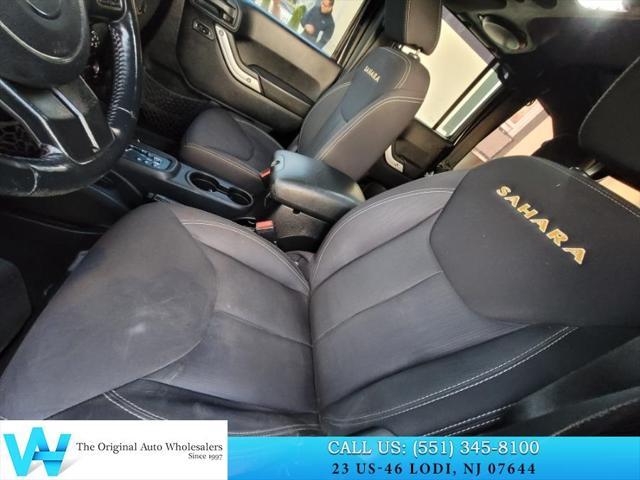 used 2014 Jeep Wrangler Unlimited car, priced at $9,997