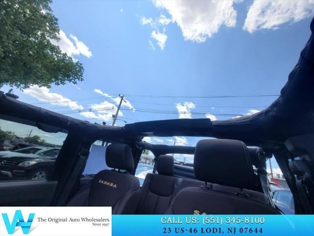 used 2014 Jeep Wrangler Unlimited car, priced at $9,997