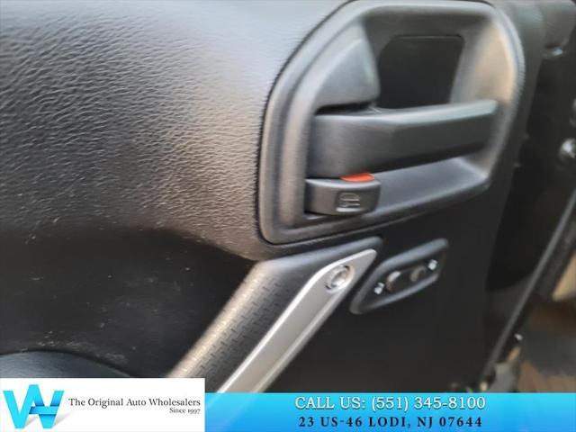 used 2014 Jeep Wrangler Unlimited car, priced at $9,997