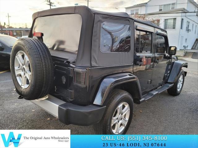 used 2014 Jeep Wrangler Unlimited car, priced at $9,997