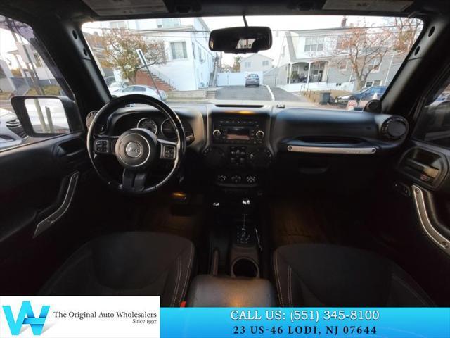 used 2014 Jeep Wrangler Unlimited car, priced at $11,997