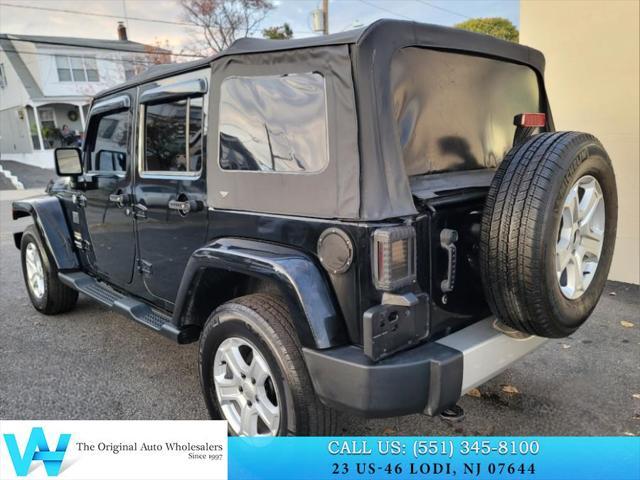 used 2014 Jeep Wrangler Unlimited car, priced at $11,997