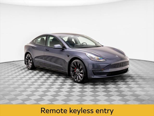 used 2023 Tesla Model 3 car, priced at $33,400