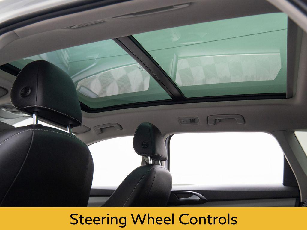 used 2023 Volkswagen Taos car, priced at $21,000