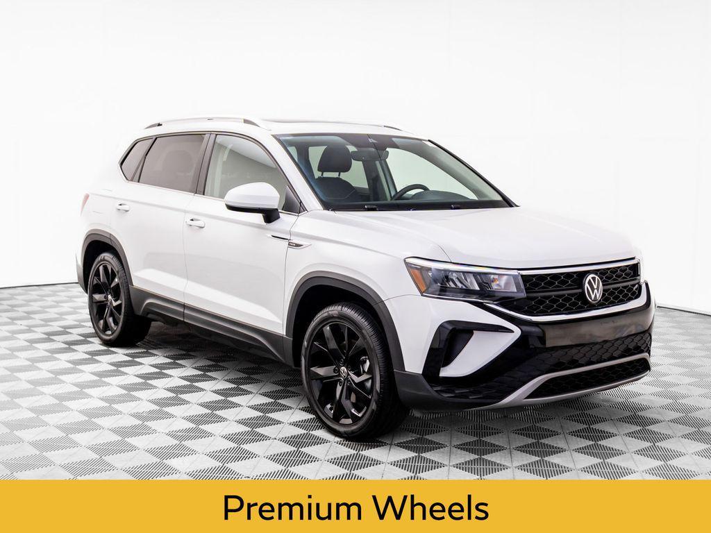 used 2023 Volkswagen Taos car, priced at $21,000