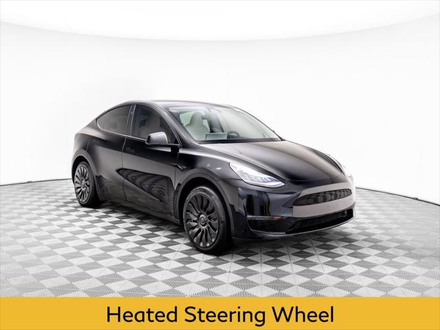 used 2023 Tesla Model Y car, priced at $32,700