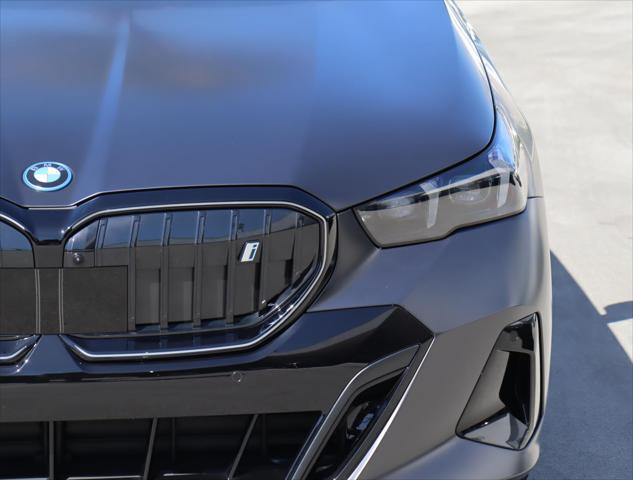 used 2025 BMW i5 car, priced at $67,880