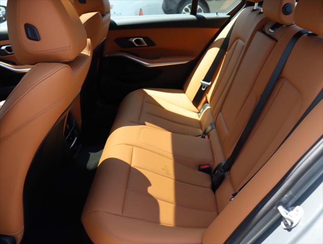 new 2025 BMW 330 car, priced at $49,975