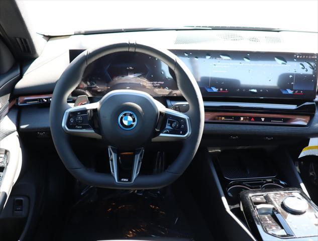 new 2026 BMW i5 car, priced at $74,625