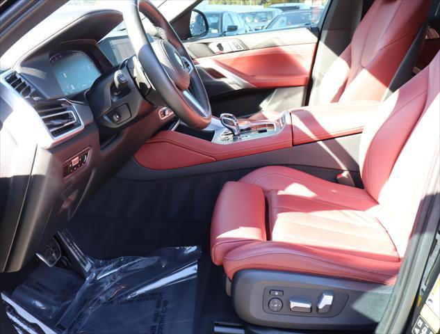 used 2022 BMW X6 car, priced at $56,880