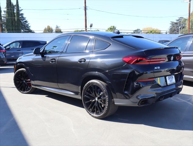 used 2022 BMW X6 car, priced at $56,880