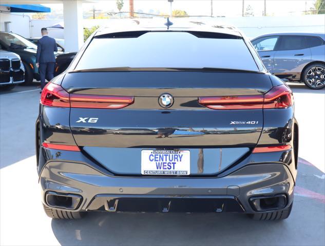 used 2022 BMW X6 car, priced at $56,880