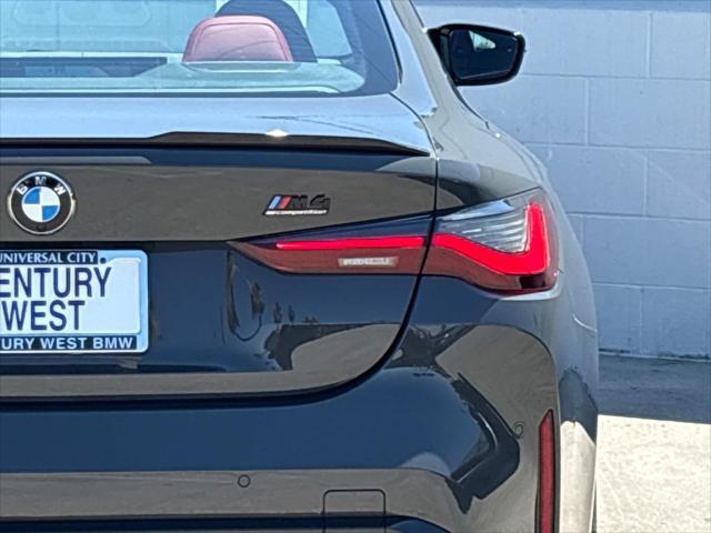 used 2024 BMW M4 car, priced at $99,945