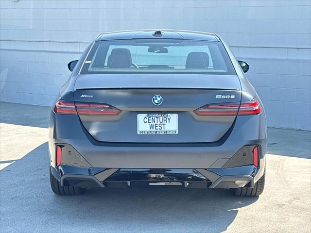 new 2026 BMW 550e car, priced at $85,675