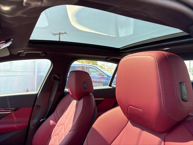 new 2026 BMW 550e car, priced at $85,675