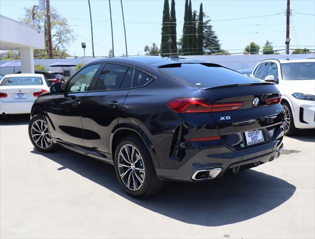 used 2024 BMW X6 car, priced at $68,885