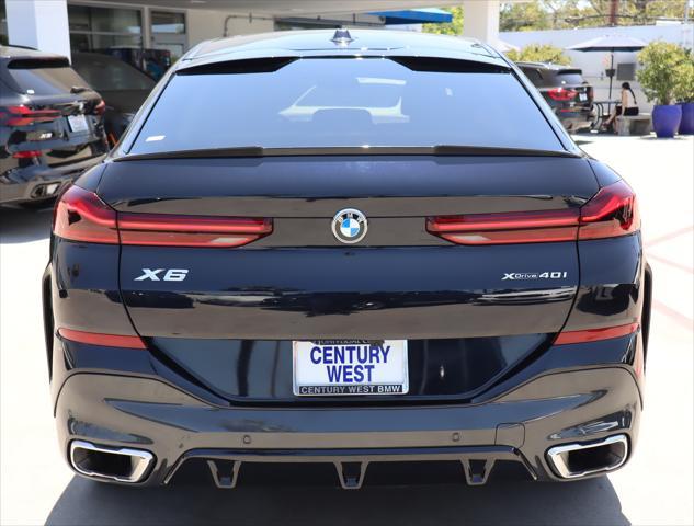 used 2024 BMW X6 car, priced at $68,885