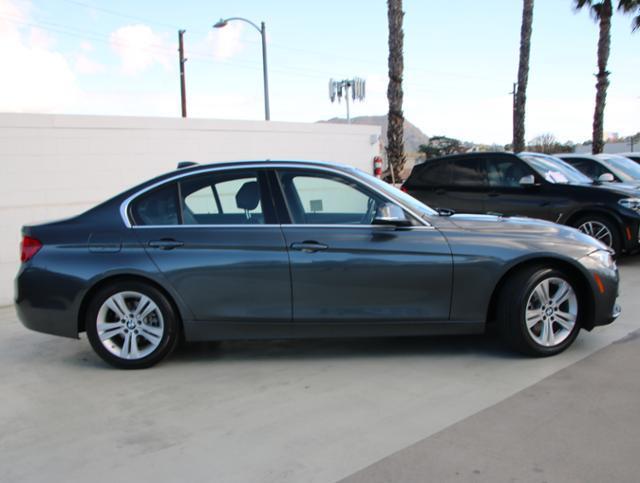 used 2018 BMW 330 car, priced at $19,880