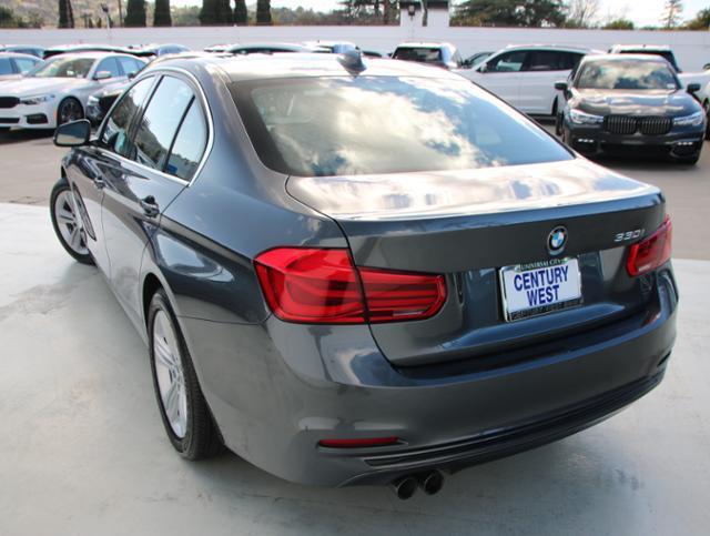 used 2018 BMW 330 car, priced at $19,880