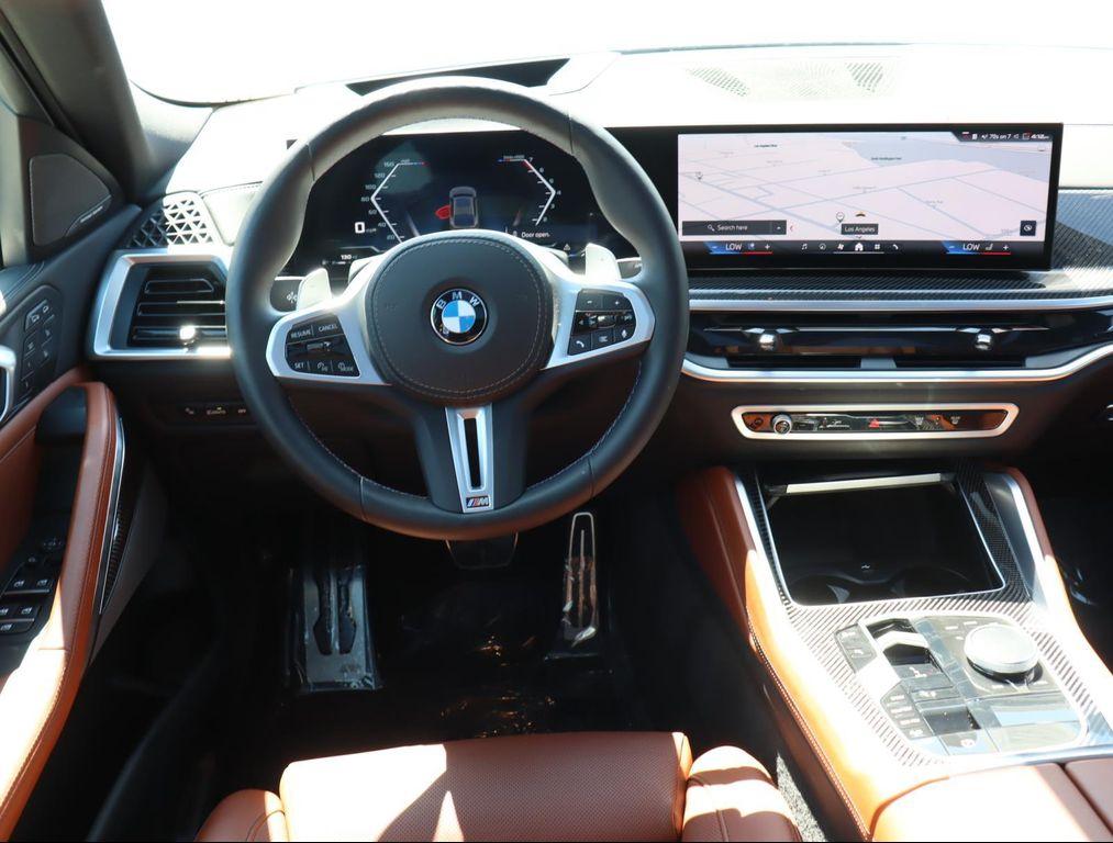 used 2025 BMW X6 car, priced at $89,775
