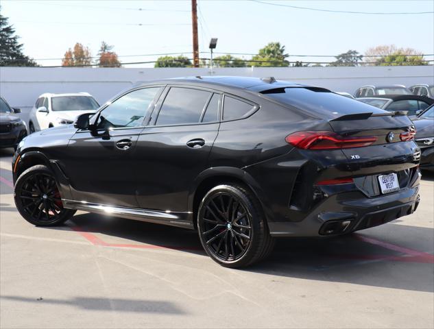 used 2025 BMW X6 car, priced at $97,910