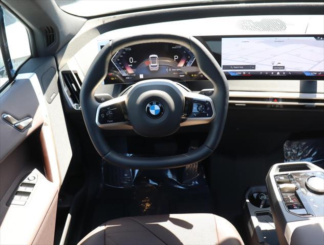 new 2026 BMW iX car, priced at $78,175