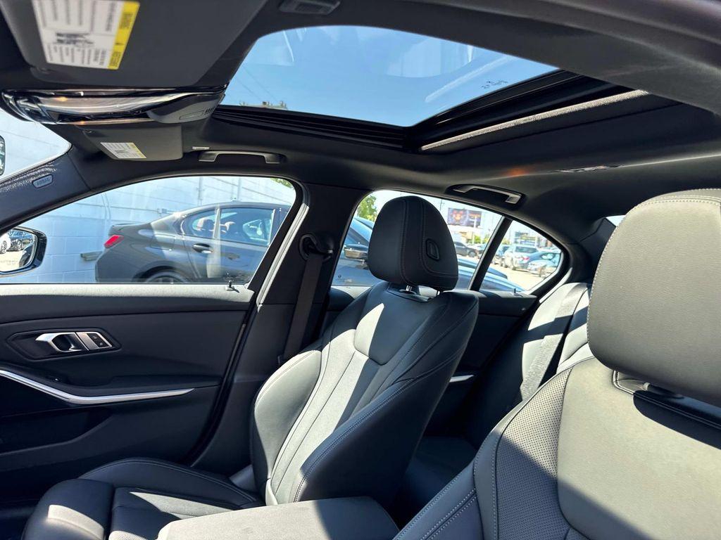 used 2023 BMW 330e car, priced at $37,880