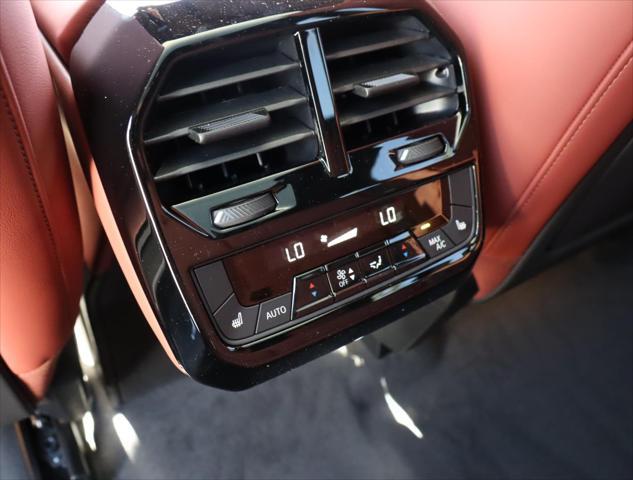 new 2026 BMW iX car, priced at $104,775