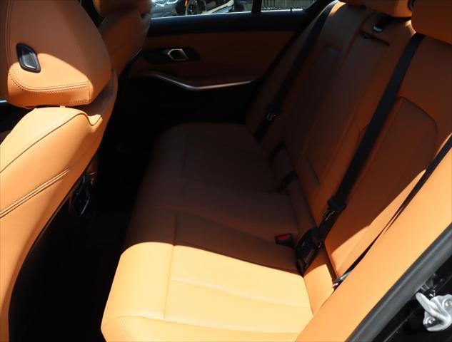 new 2025 BMW 330 car, priced at $49,975