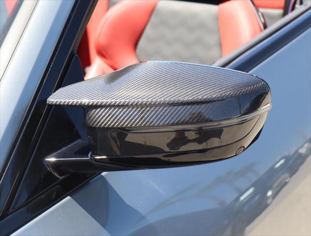 used 2023 BMW M4 car, priced at $87,970