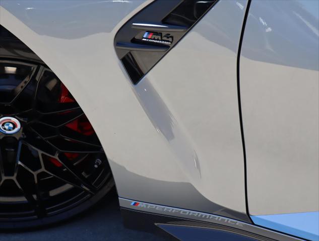 used 2023 BMW M4 car, priced at $87,970