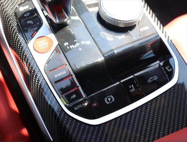 used 2023 BMW M4 car, priced at $87,970