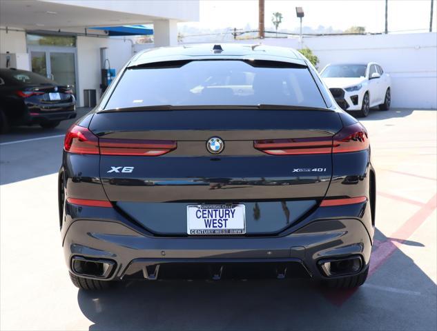 used 2024 BMW X6 car, priced at $84,995