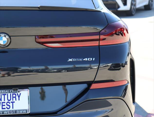 used 2024 BMW X6 car, priced at $84,995