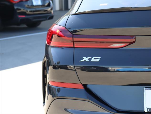 used 2024 BMW X6 car, priced at $84,995