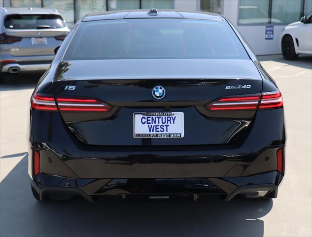 used 2024 BMW i5 car, priced at $67,945