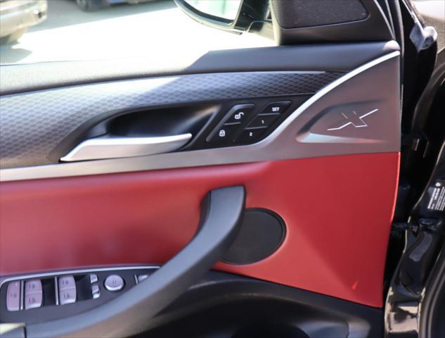 used 2022 BMW X4 car, priced at $43,880