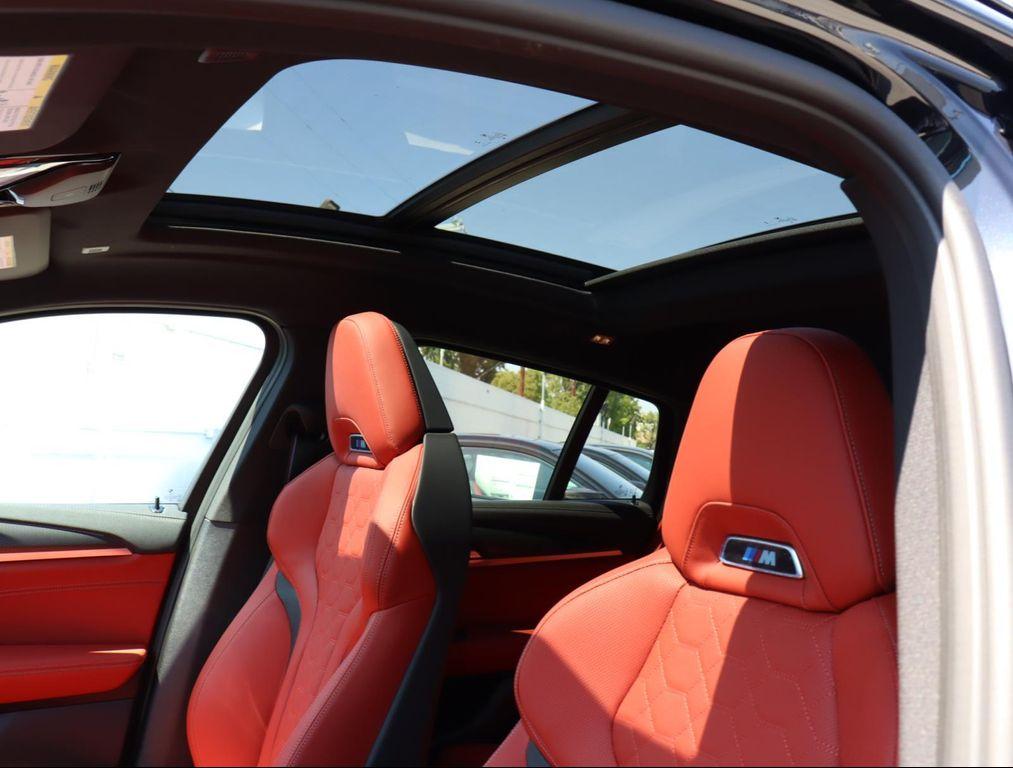 new 2025 BMW X4 M car, priced at $93,295