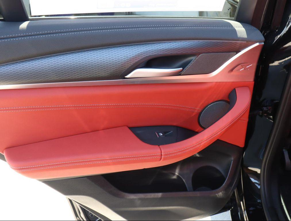 new 2025 BMW X4 M car, priced at $93,295