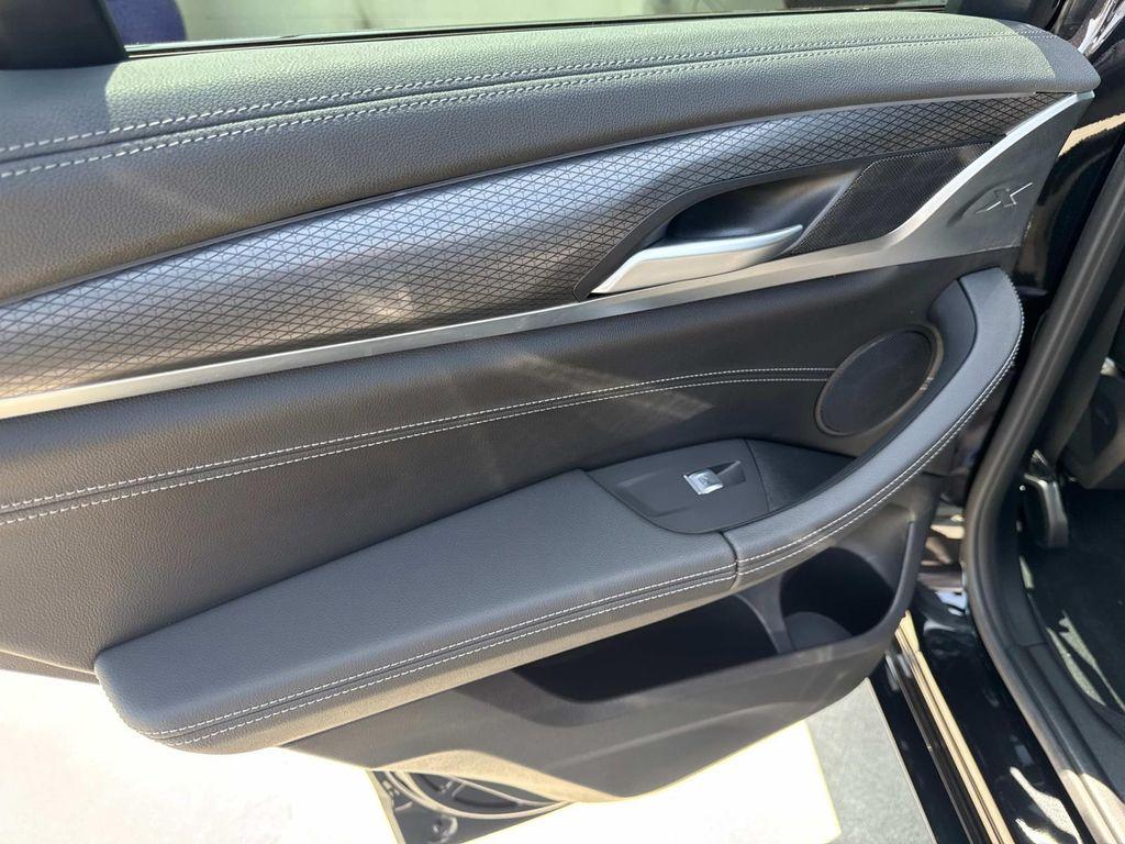 used 2024 BMW X4 car, priced at $54,880