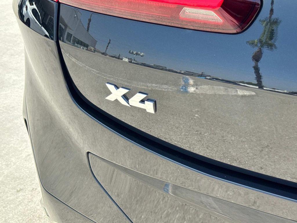 used 2024 BMW X4 car, priced at $54,880