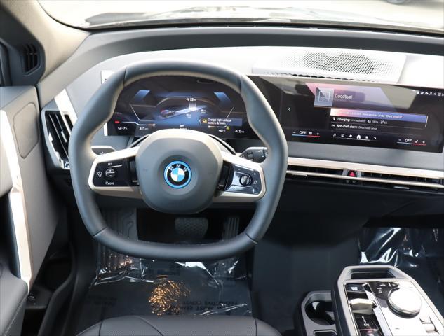 new 2025 BMW iX car, priced at $88,425