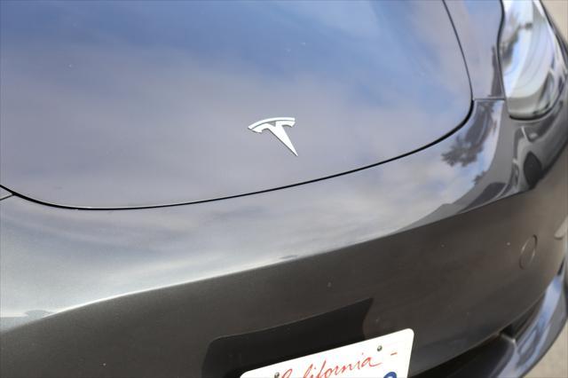 used 2023 Tesla Model 3 car, priced at $34,880