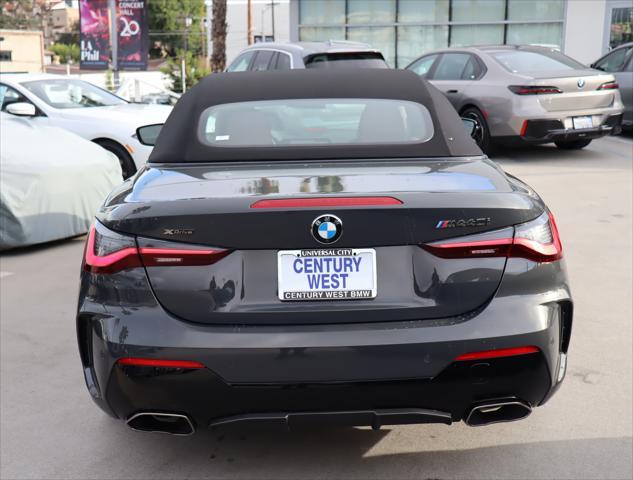 used 2023 BMW M4 car, priced at $69,985
