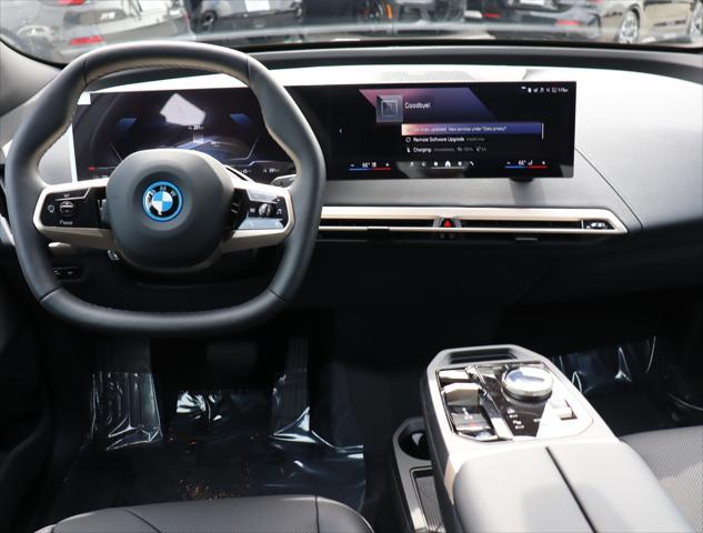 new 2025 BMW iX car, priced at $98,725