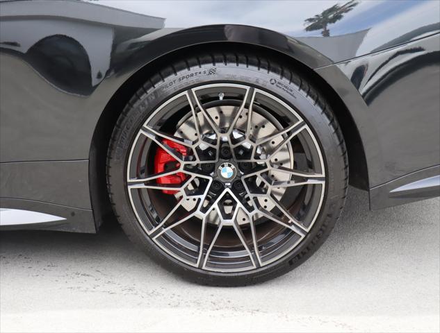 used 2024 BMW M4 car, priced at $77,770