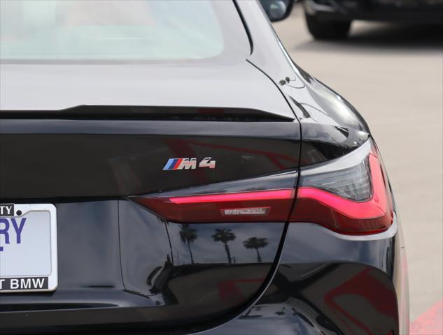 used 2024 BMW M4 car, priced at $77,770